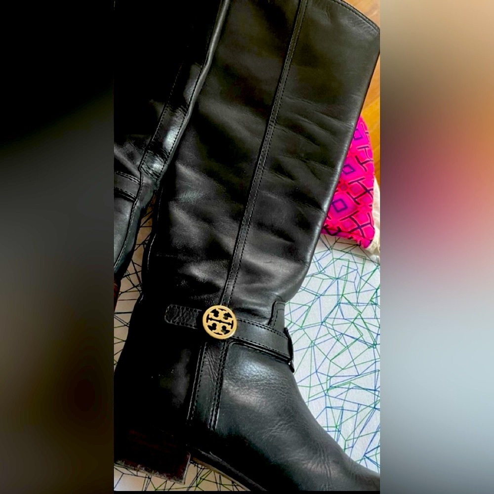 Tory Burch boots. Great condition. No flaws. Barely worn!!! Dust bag included